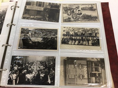 Lot 1400 - Postcards - An extensive collection in four albums.  Many early cards and real photographic cards including Military regiments, camps, parades, sports, Military Hospital, good animated street scene...
