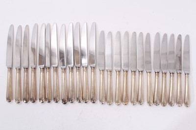 Lot 353 - 24 silver handles knives