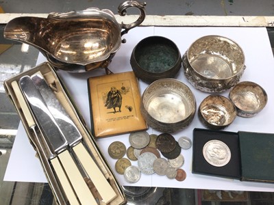 Lot 698 - Eastern white metal bowls, silver plated gravy boat, table knives, coins and sundries