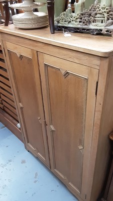 Lot 1083 - Golden oak cupboard with two panelled doors