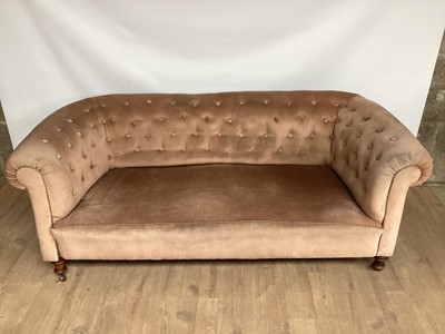 Lot 1078 - Victorian buttonedChesterfield sofa on turned legs