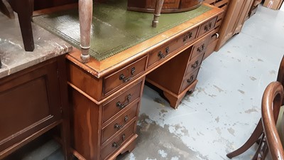 Lot 1084 - Georgian style yew wood twin pedestal desk with inset leather lined top and nine drawers below