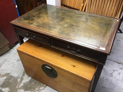 Lot 1077 - Mahogany writing table with leather lined top, two drawers on taper legs