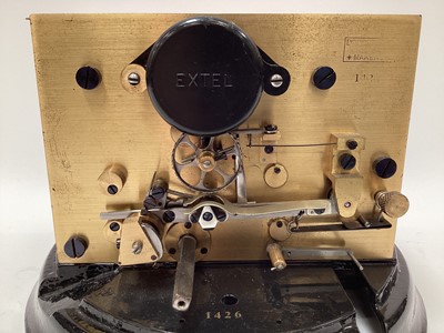 Lot 2443 - Rare early 20th century ticker tape machine by The Exchange Telegraph Co. Ltd. Number 1426, on circular cast metal black enamel base