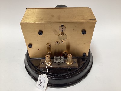 Lot 2443 - Rare early 20th century ticker tape machine by The Exchange Telegraph Co. Ltd. Number 1426, on circular cast metal black enamel base