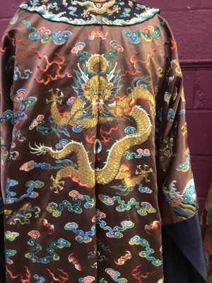 Lot 2057 - 19th Century Chinese embroidered brown silk robe with Horse Hoof cuffs, five Dragons and pale blue silk lining.