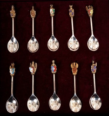 Lot 404 - Cased set of 10 silver, silver gilt and enamel set of Queens Beast spoons.