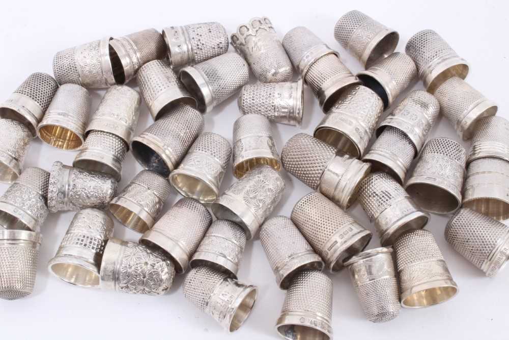 Lot 818 - Collection of forty-eight silver thimbles