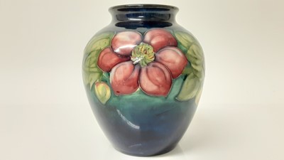 Lot 1136 - Moorcroft vase decorated in the Clematis pattern