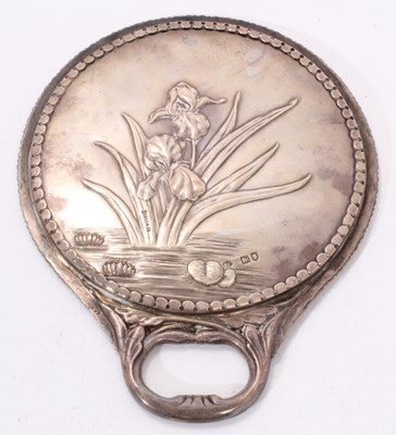 Lot 352 - Late Victorian silver mounted hand mirror decorated with irises