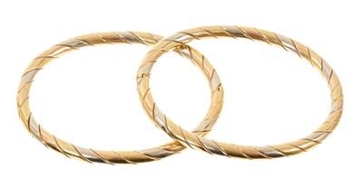 Lot 615 - Two Italian 18ct three-colour gold bangles