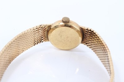 Lot 660 - Ladies Omega 9ct gold wristwatch on integral gold milanese bracelet