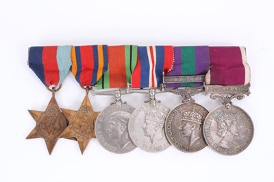 Lot 721 - Second World War and later medal group comprising 1939 - 1945 Star, Burma Star, Defence and War medals, together with a George VI General Service medal with Malaya clasp, named to 21005033 SJT. J....