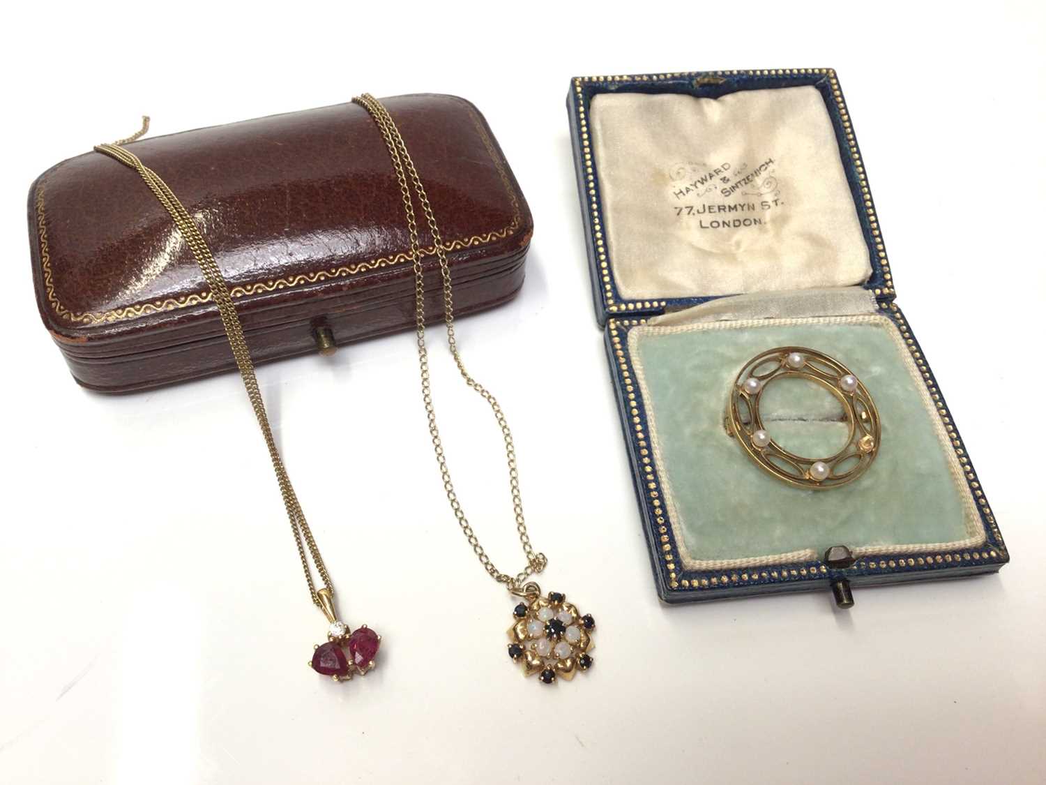 Lot 66 - Edwardian gold seed pearl brooch and two 9ct gold chains with gem set pendants