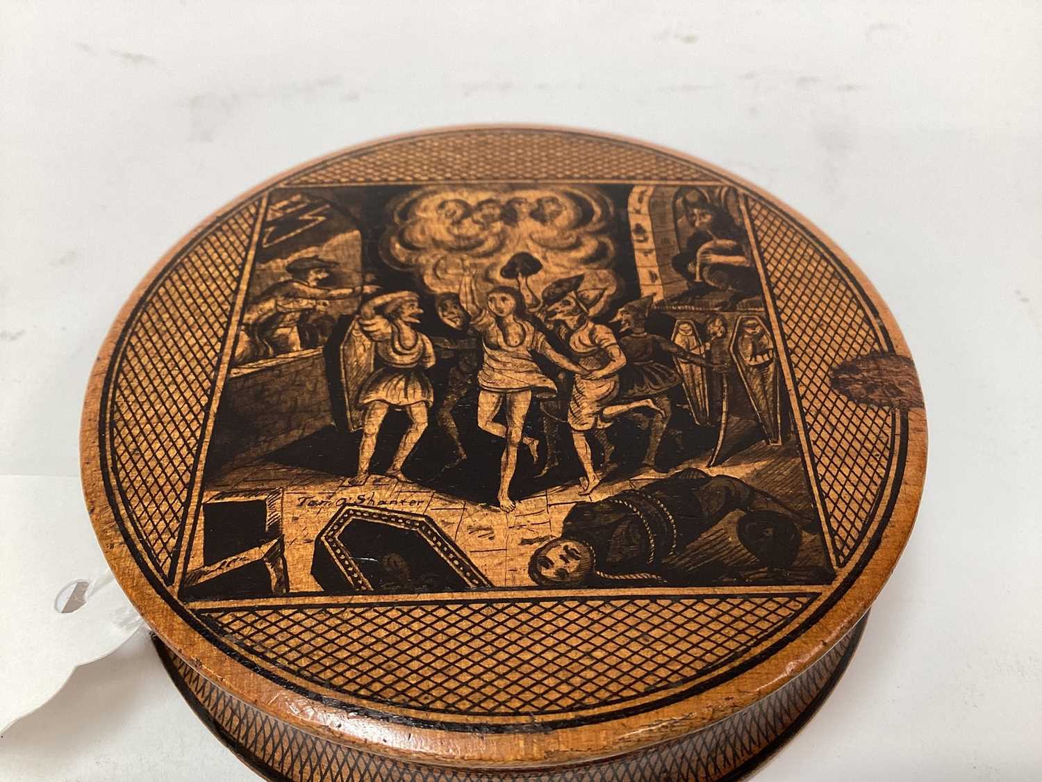 Lot 2468 - Rare Victorian Mauchline ware snuff box, with a penwork titled scene from the 'Tam O'Shanter', 9cm across