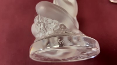 Lot 1016 - Lalique Floreal glass figure of a kneeling nude female, 8cm high, together with another Lalique glass nude female figure, both signed Lalique France (2)