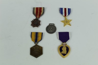 Lot 745 - Collection of six various American First / Second World and other medals to include Purple Heart, Silver Star, and Harvard Athletic medal, some replicas noted (6 medals).