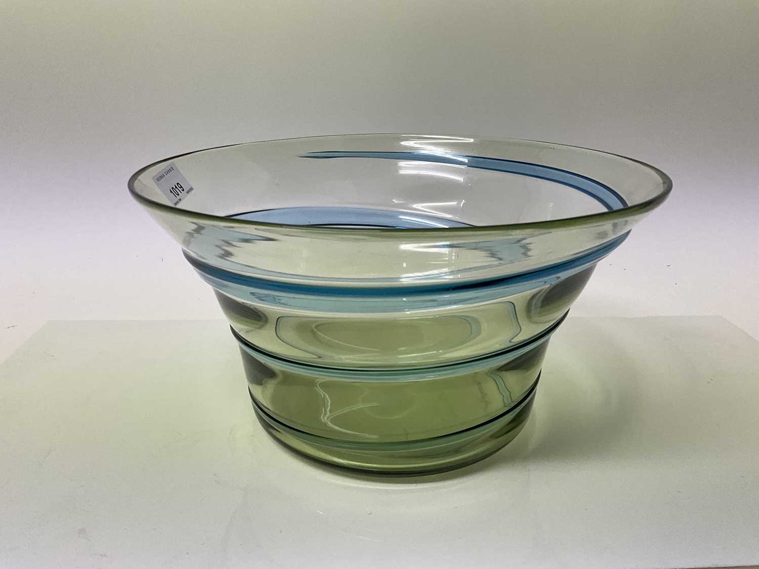 Lot 1019 - Large Whitefriars green glass bowl with blue ribbon trailed decoration, possibly by Barnaby Powell, 16cm high, 29cm diameter