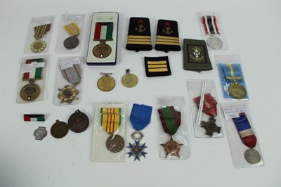 Lot 746 - Collection of various medals to include Kuwait Liberation medal, Hong Kong Service medal and others, together with military badges.