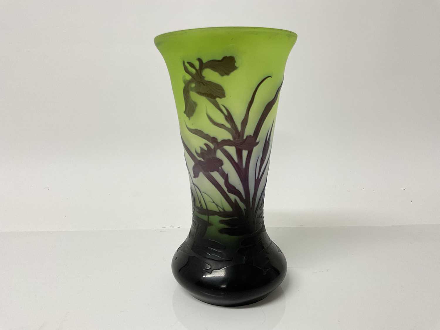 Lot 1023 - Emile Galle cameo glass vase with floral decoration on green ground, signed, 20cm high