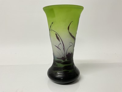 Lot 1023 - Emile Galle cameo glass vase with floral decoration on green ground, signed, 20cm high