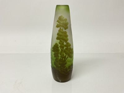 Lot 1028 - Emile Galle cameo glass vase with trees in landscape decoration, signed, 18cm high