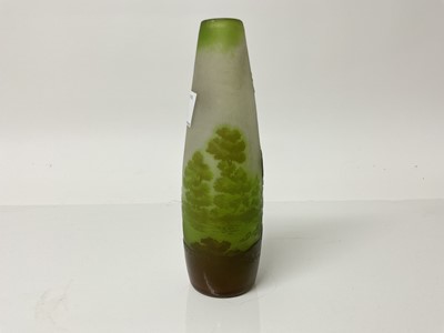 Lot 1028 - Emile Galle cameo glass vase with trees in landscape decoration, signed, 18cm high