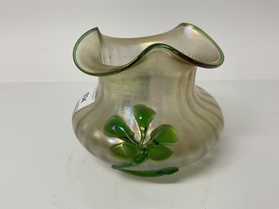 Lot 1037 - Loetz style Kralik iridescent glass vase decorated with a green flower, 11cm high