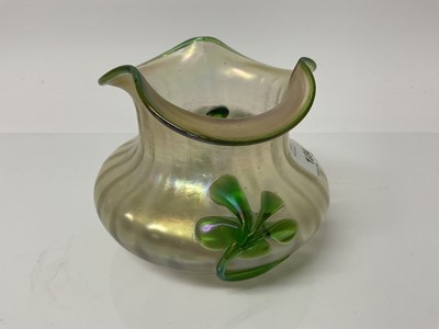 Lot 1318 - Loetz style Kralik iridescent glass vase decorated with a green flower, 11cm high
