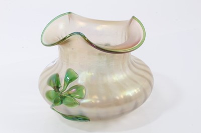 Lot 1318 - Loetz style Kralik iridescent glass vase decorated with a green flower, 11cm high