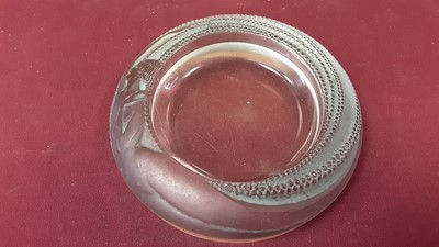 Lot 1038 - R.Lalique circular dish/coaster with nude lady decoration, signed, 14cm diameter