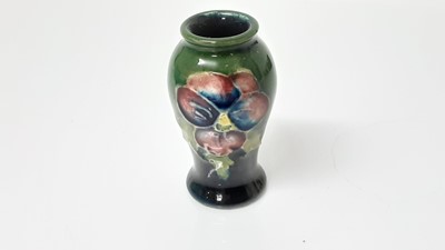 Lot 1044 - Eight Moorcroft miniature vases, various patterns, together with a Moorcroft Macintyre vase