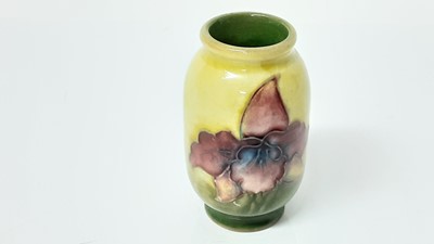 Lot 1044 - Eight Moorcroft miniature vases, various patterns, together with a Moorcroft Macintyre vase