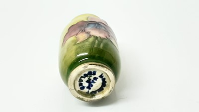 Lot 1044 - Eight Moorcroft miniature vases, various patterns, together with a Moorcroft Macintyre vase