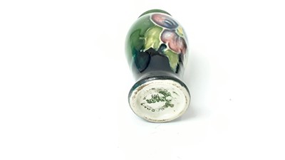 Lot 1044 - Eight Moorcroft miniature vases, various patterns, together with a Moorcroft Macintyre vase