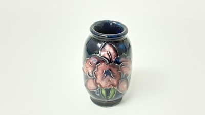 Lot 1044 - Eight Moorcroft miniature vases, various patterns, together with a Moorcroft Macintyre vase