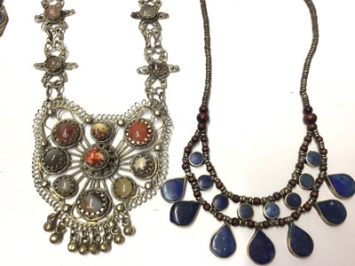 Lot 96 - Three Eastern white metal necklaces set with lapis lazuli, agate necklace, Egyptian necklace and a box