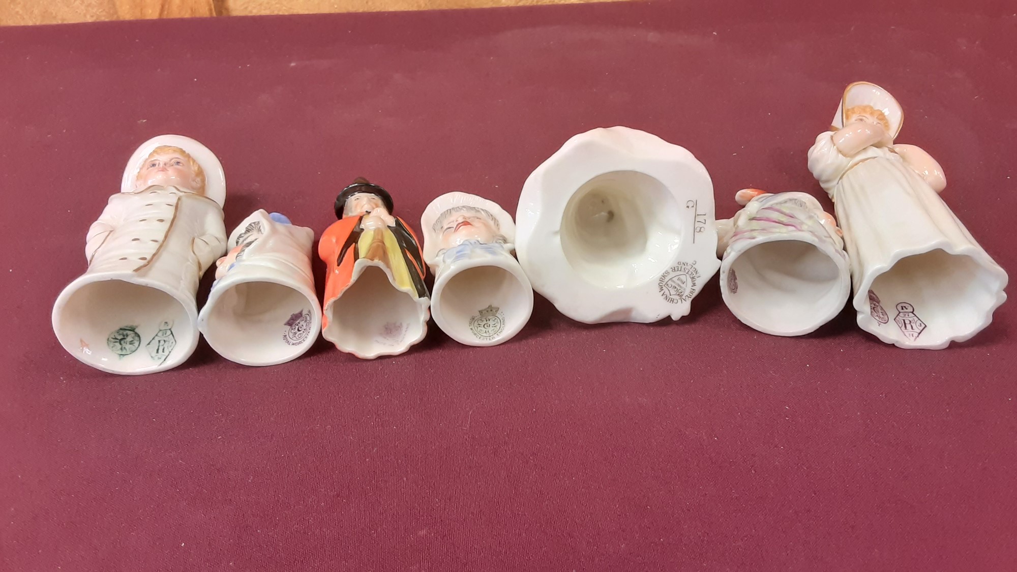 Lot 1054 Fourteen Royal Worcester candle snuffers