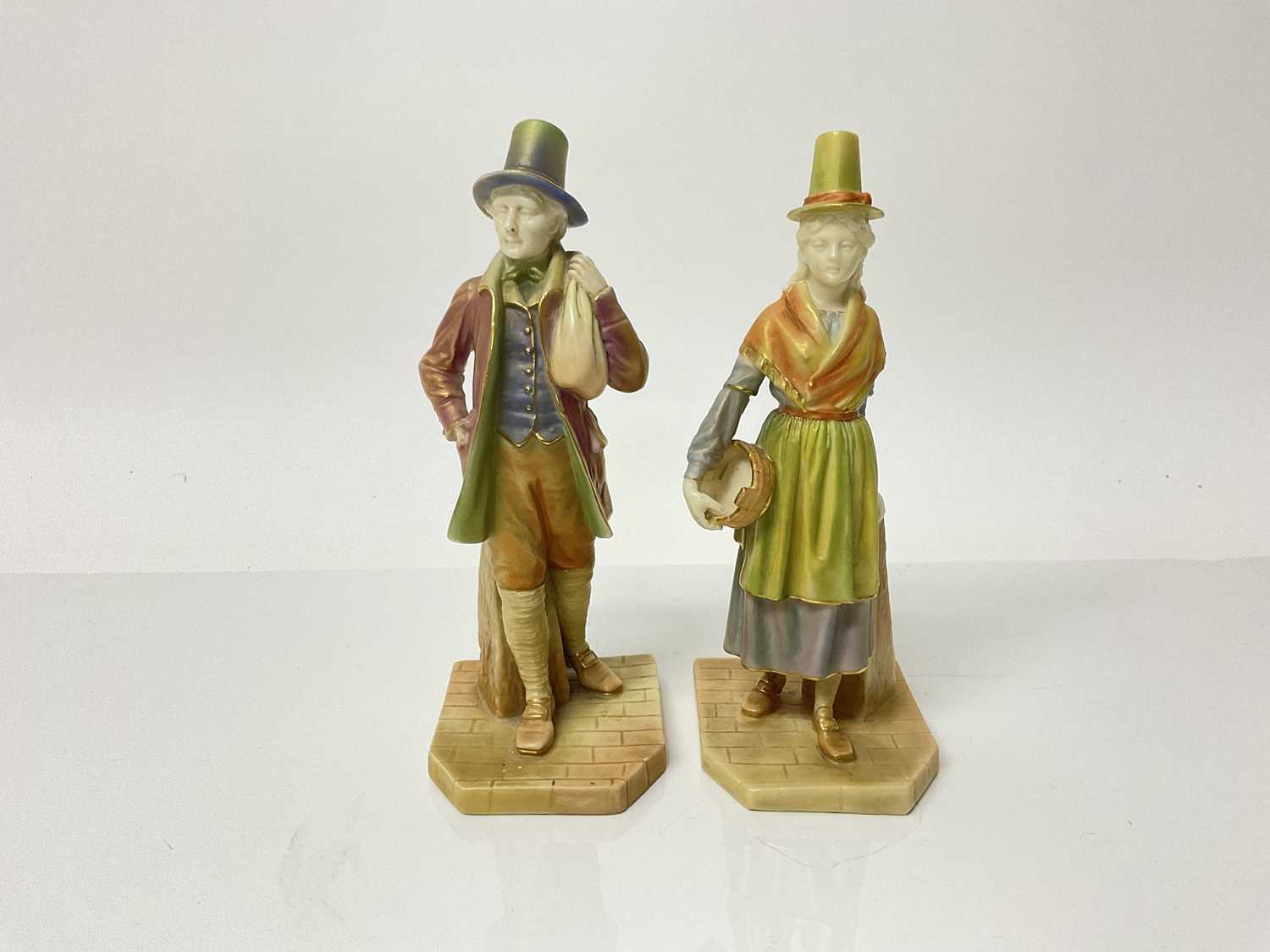 Lot 1057 - Two Royal Worcester figures - Welsh lady and Welsh gentlemen, 17cm high