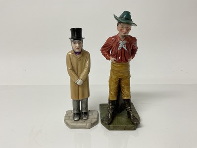 Lot 1060 - Two Royal Worcester male figures, both wearing hats, tallest is 17.5cm high, the other is 15.5cm high