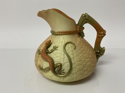 Lot 1062 - Royal Worcester blush ivory jug with basket weave moulded body and applied lizard decoration, 14.5cm high