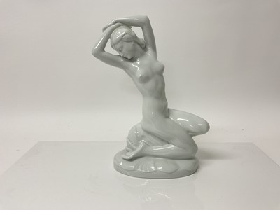 Lot 1072 - Large Karl Ens blanc de chine model of a kneeling nude female, 32cm high