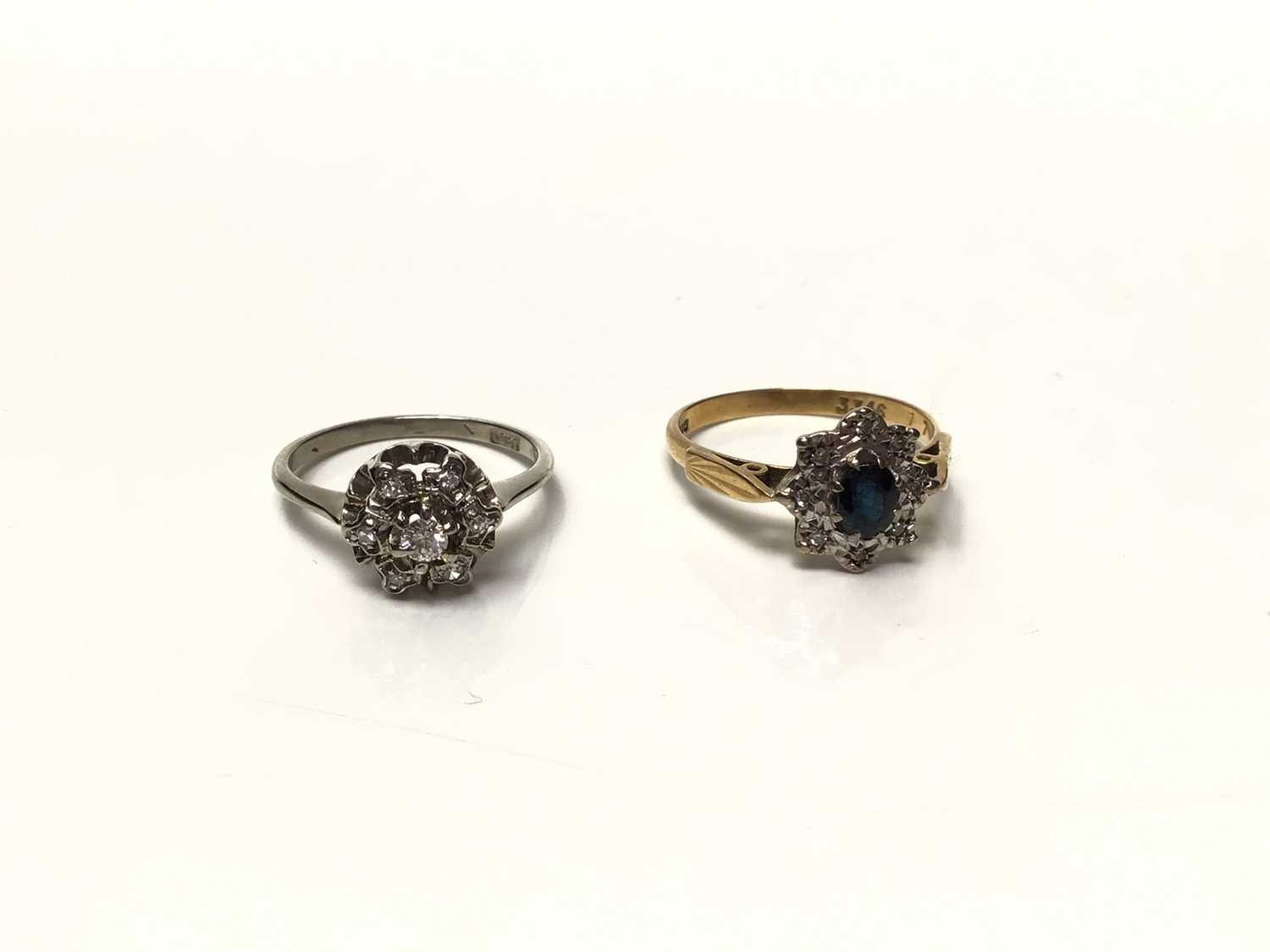 Lot 107 - 18ct white gold diamond cluster ring and 18ct yellow gold sapphire and diamond cluster ring