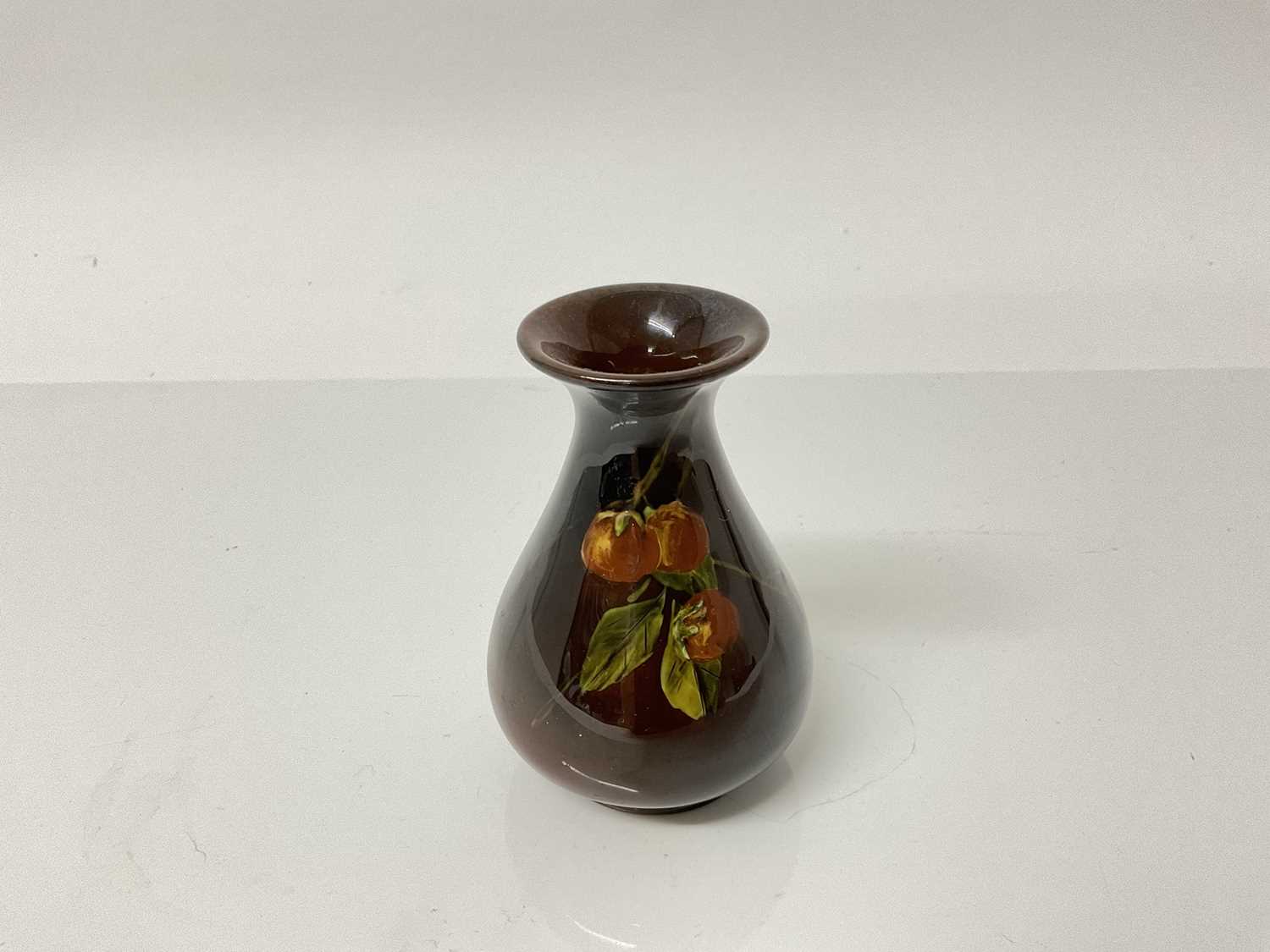 Lot 1078 - Small Rookwood pottery brown glazed vase, impressed marks to base, 9cm high