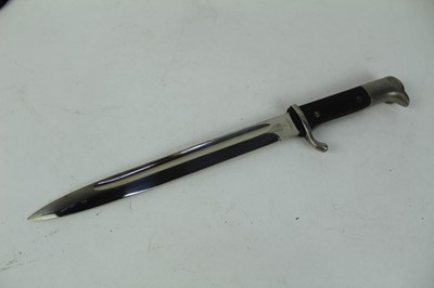 Lot 877 - Nazi Parade bayonet (long model) with black checkered platic grips, polished steel blade (retaining all original polish) by E. Pack, Solingen in scabbard with frog, dated 1941.