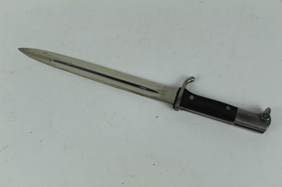 Lot 877 - Nazi Parade bayonet (long model) with black checkered platic grips, polished steel blade (retaining all original polish) by E. Pack, Solingen in scabbard with frog, dated 1941.