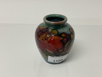 Lot 1108 - Moorcroft pottery vase decorated in the leaf and berry pattern, impressed marks, Potter To HM The Queen, painted signature, 8.5cm high