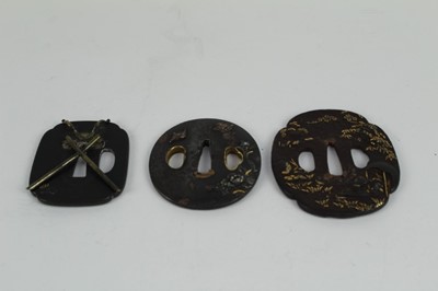 Lot 761 - Japanese bronze tsuba with later soldered stand to reverse together with two other bronze tsuba's (3)