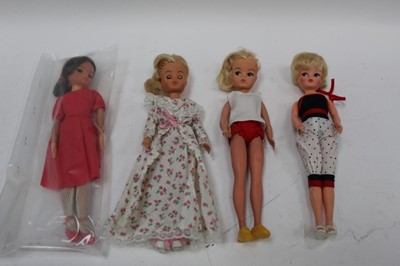 Lot 1813 - Sindy dolls 0333390, 033055 x 2 plus another Sindy doll and a quantity of outfits.