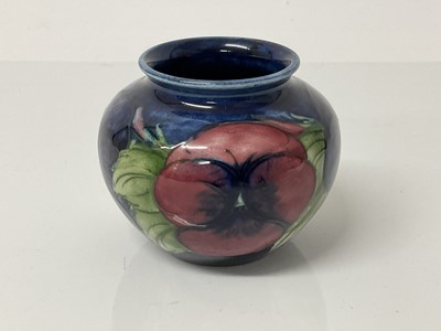 Lot 1112 - Moorcroft pottery vase decorated in the pansy pattern, impressed marks to base, 7cm high